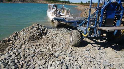 A boat gets barged. i a lake.