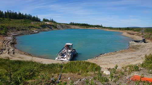 A boat in a small lake.