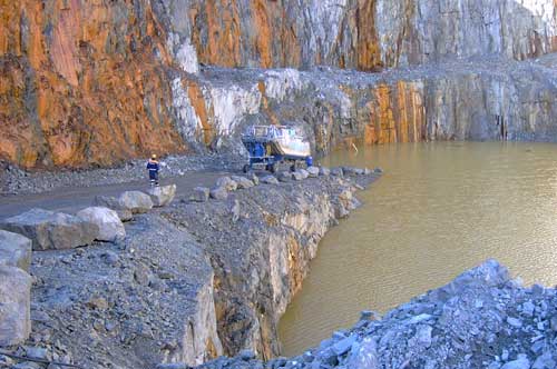A boat gets barged in a lake.